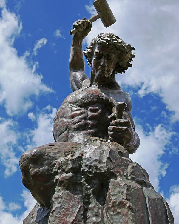 4 pasos para construir tu realidad - escultura de hombre