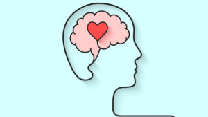 dibujo de una cabeza con dentro cerebro con en medio un corazón